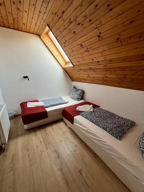 Postel nebo postele na pokoji v ubytování Centrum Motel