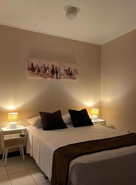 Postel nebo postele na pokoji v ubytování Gaudy's Hotel