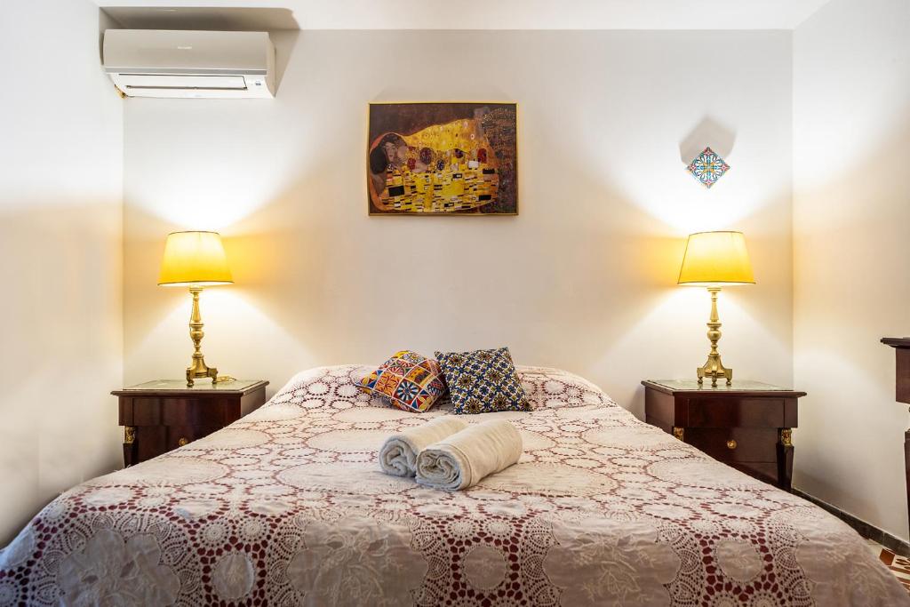 Letto o letti in una camera di A pochi passi dal mare