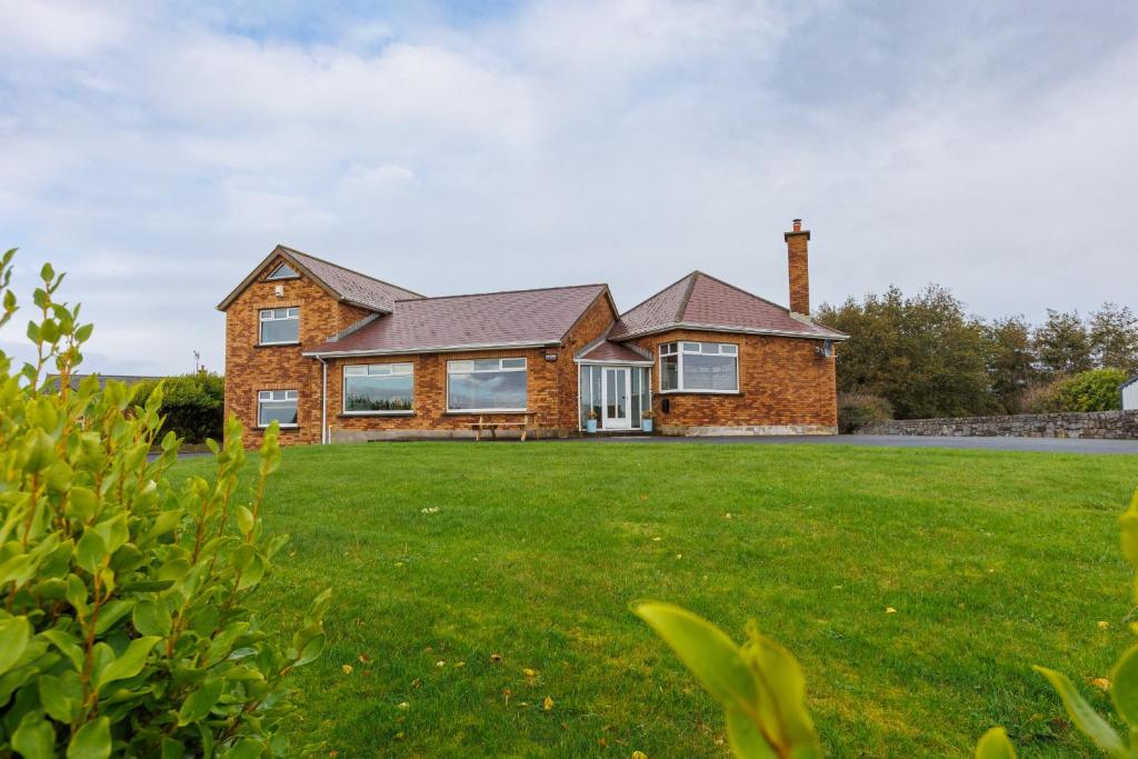 Zahrada ubytování Red Brick House Rosses Point