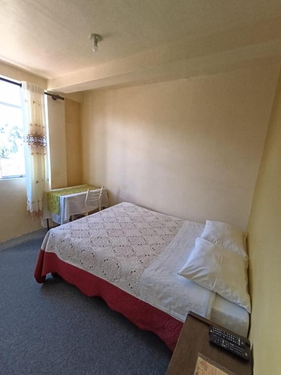 Postel nebo postele na pokoji v ubytování Hotel Summita