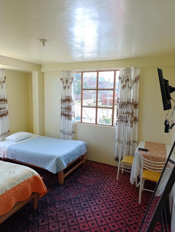 Postel nebo postele na pokoji v ubytování Hotel Summita