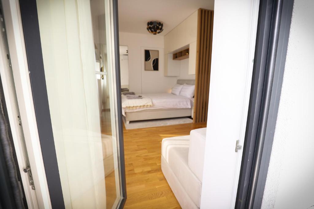Postel nebo postele na pokoji v ubytování Apartman Aleksandra Vrnjacka Banja