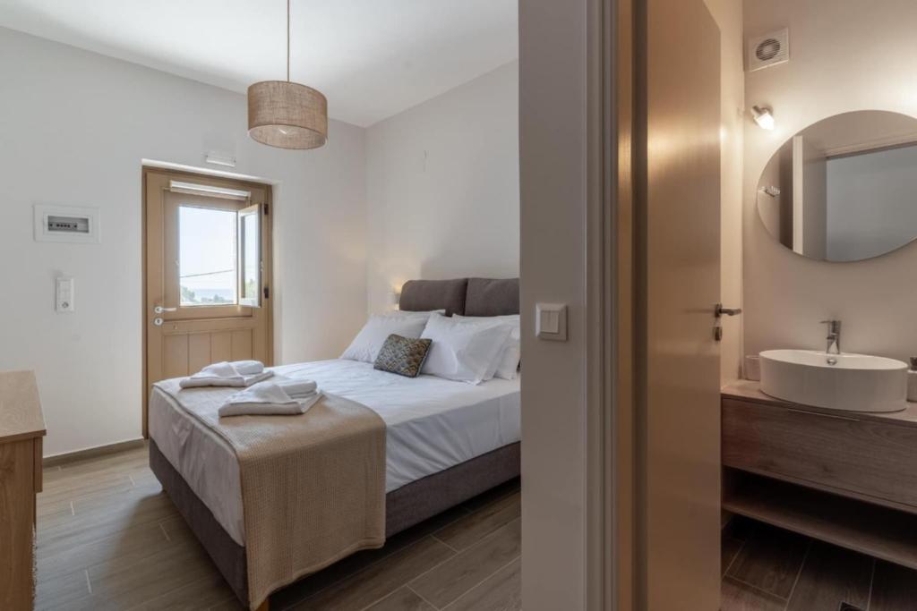 Postel nebo postele na pokoji v ubytování Istorima Guesthouse
