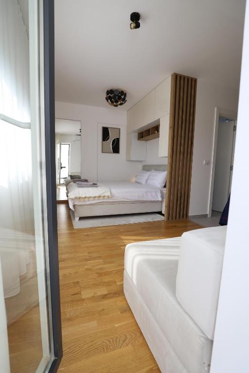 Postel nebo postele na pokoji v ubytování Apartman Aleksandra Vrnjacka Banja