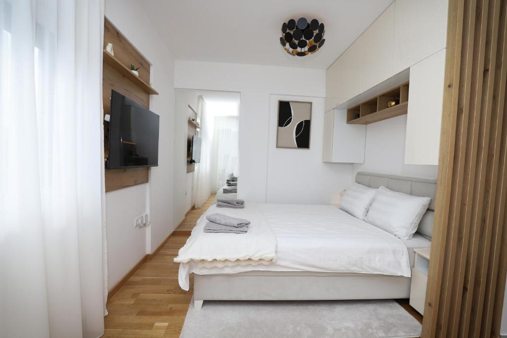 Postel nebo postele na pokoji v ubytování Apartman Aleksandra Vrnjacka Banja
