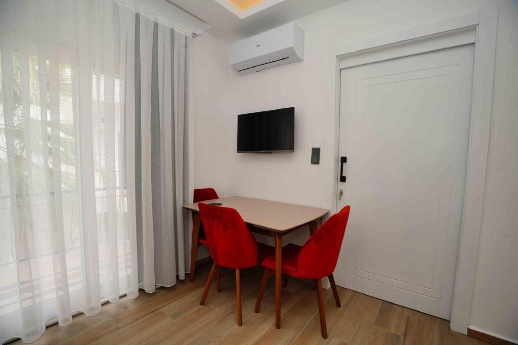 TV a/nebo společenská místnost v ubytování Sofia Residence
