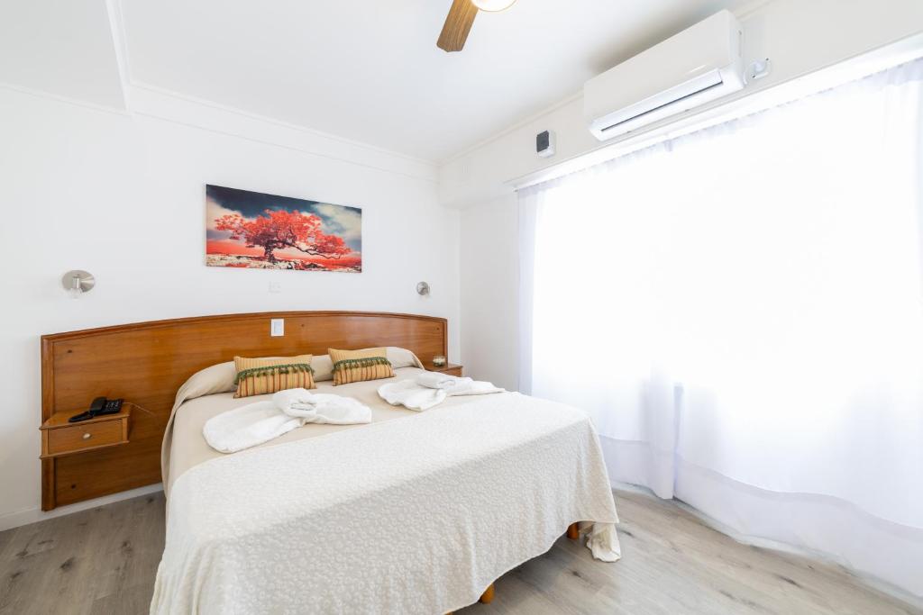 Postel nebo postele na pokoji v ubytování Hotel España