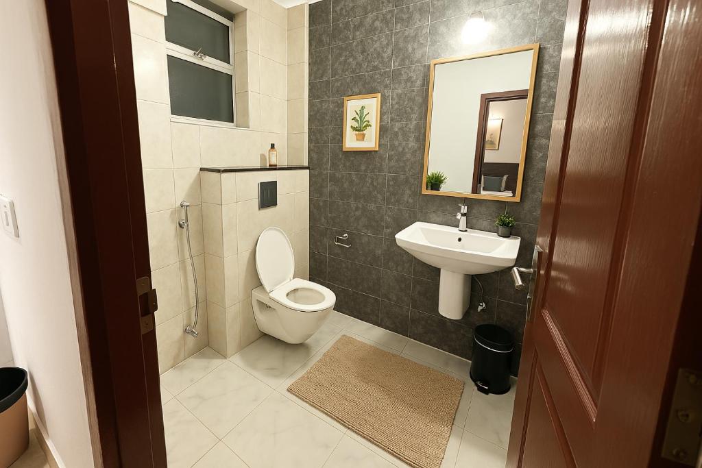 Koupelna v ubytování Wonderland Service Apartment Medanta