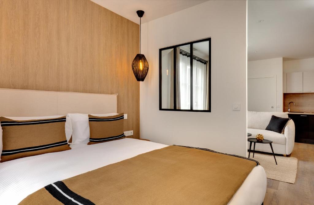 Posteľ alebo postele v izbe v ubytovaní Les Appartements de Collioure