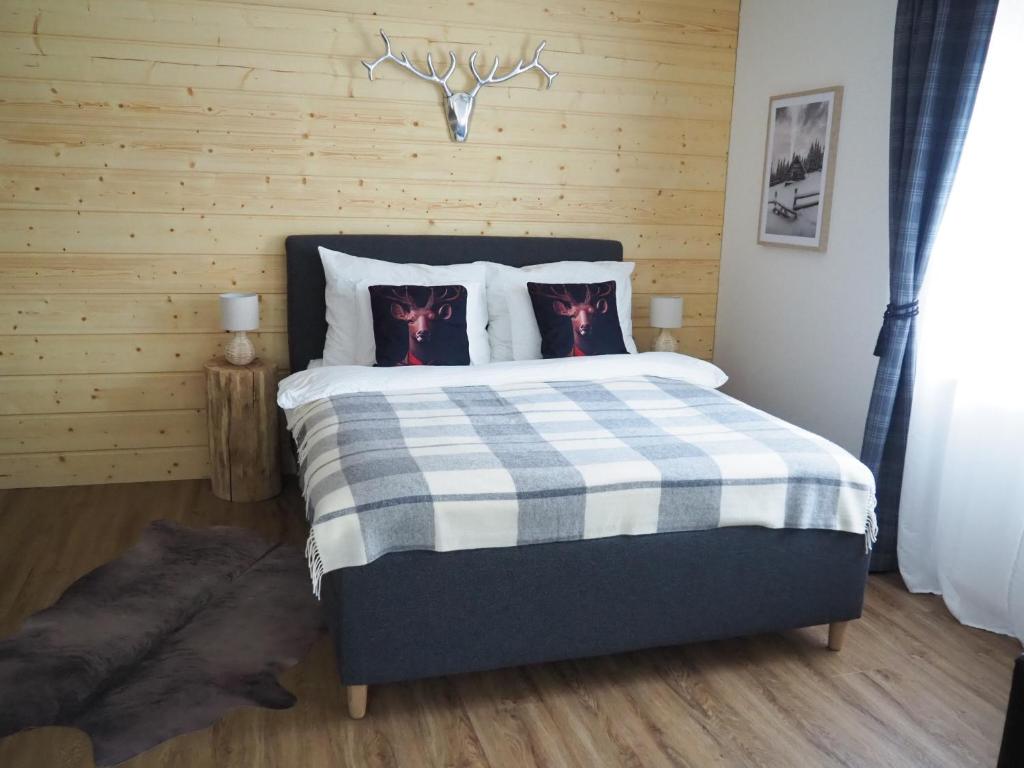 Postel nebo postele na pokoji v ubytování My Deer Apartment