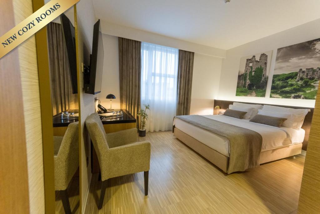 Postel nebo postele na pokoji v ubytování Hotel Jarun
