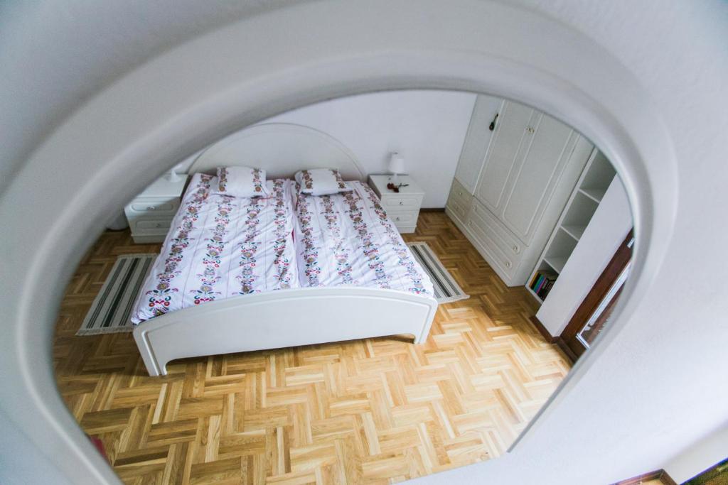 Postel nebo postele na pokoji v ubytování Grand View Apartments