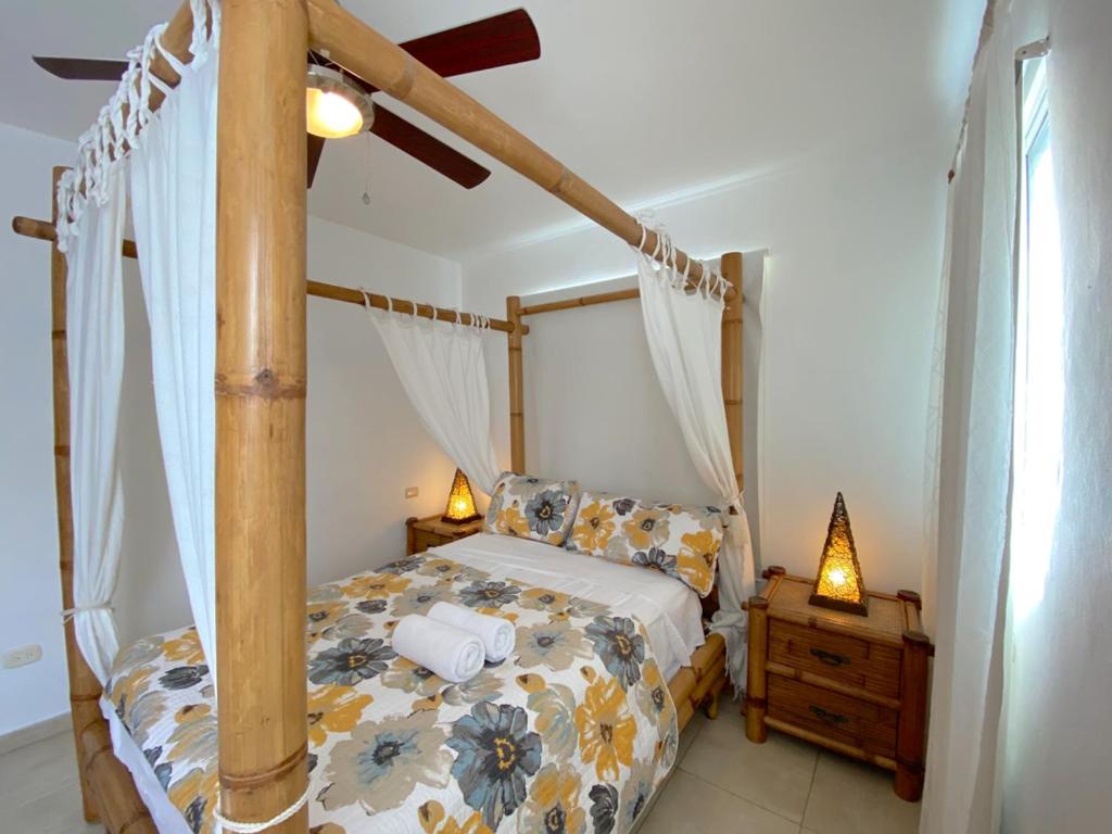 Postel nebo postele na pokoji v ubytování CARIBBEAN DREAM Villas & Apartments ocean view Playa LOS CORALES