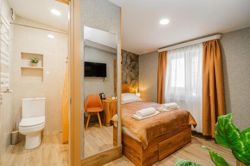 Postel nebo postele na pokoji v ubytování Old Askana