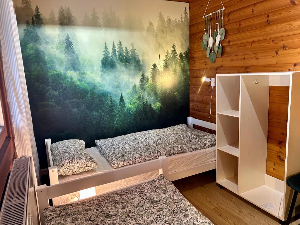 Postel nebo postele na pokoji v ubytování Zum Vogelhäuschen