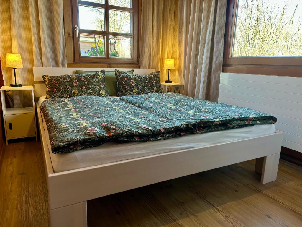 Postel nebo postele na pokoji v ubytování Zum Vogelhäuschen