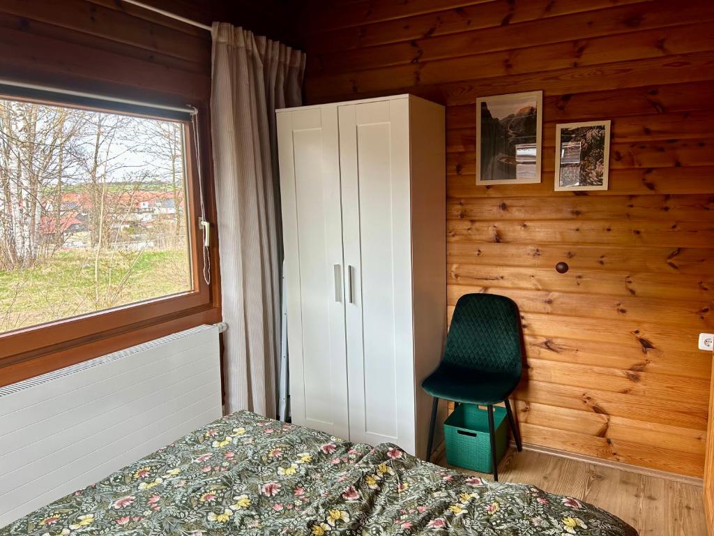 Postel nebo postele na pokoji v ubytování Zum Vogelhäuschen