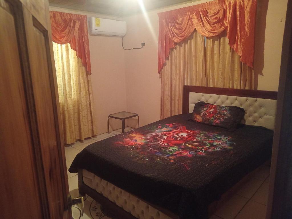 Postel nebo postele na pokoji v ubytování casa pive nice