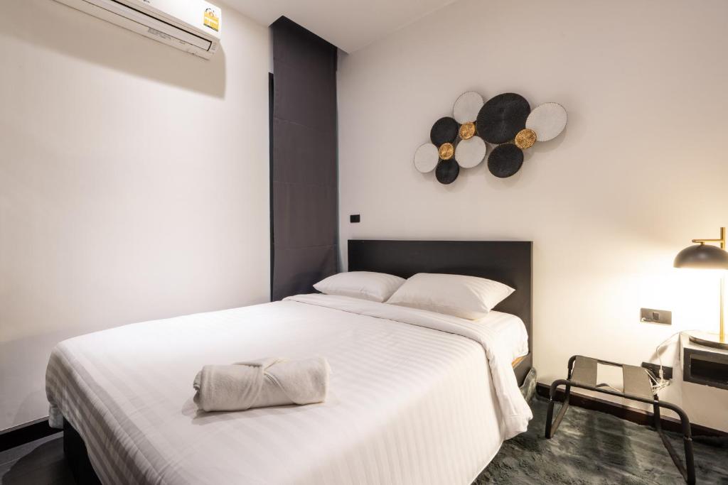 Postel nebo postele na pokoji v ubytování Coco Pool Villa