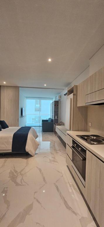 Kuchyň nebo kuchyňský kout v ubytování Hermoso apartamento en Pozos Colorados Santa Marta