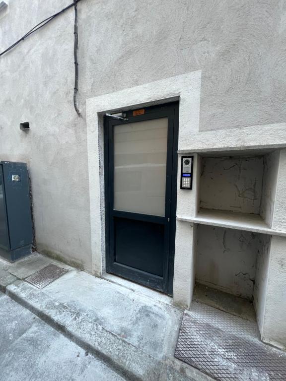 a door in the side of a building at Apparemment T2 in Albertville