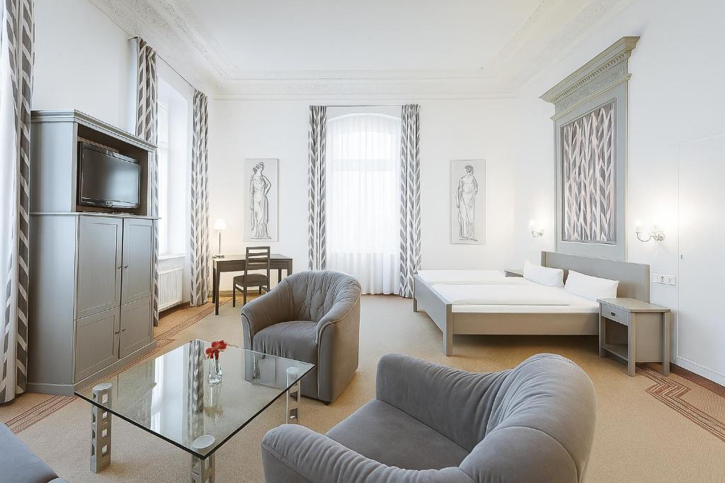 Postel nebo postele na pokoji v ubytování Hotel Villa Kipping am Hauptbahnhof