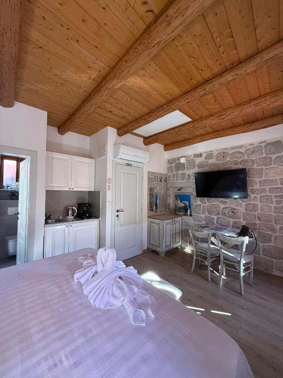 Televízia a/alebo spoločenská miestnosť v ubytovaní Dubrovnik Throne Suite IV