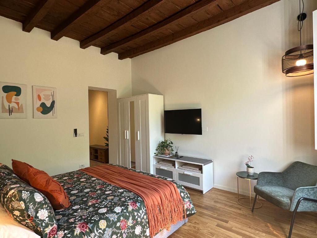 Televízia a/alebo spoločenská miestnosť v ubytovaní Navigli Vibes By Nabstays