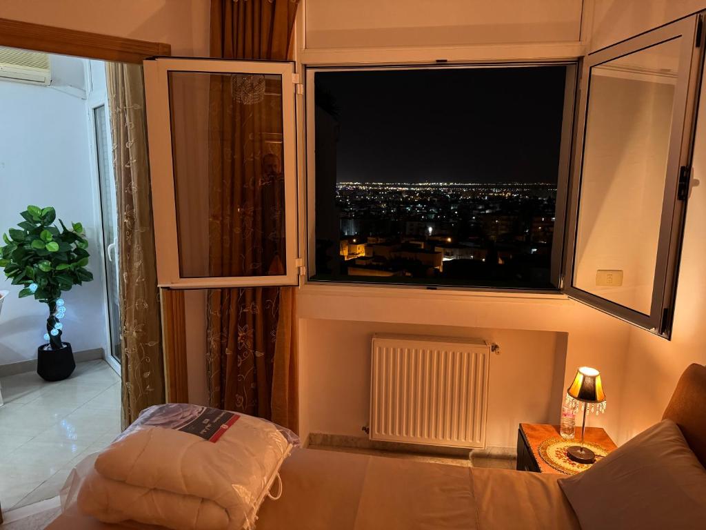 Postel nebo postele na pokoji v ubytování Vue panoramique & Confort comme un Hôtel