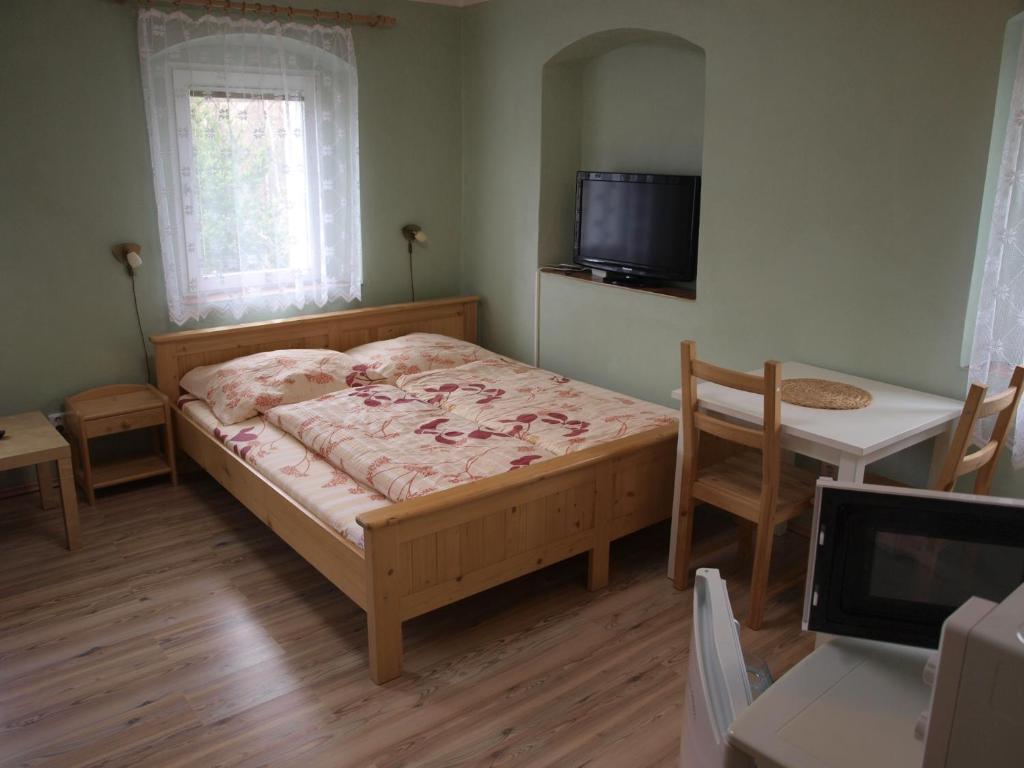 Postel nebo postele na pokoji v ubytování Apartments Viktoria Klinovec