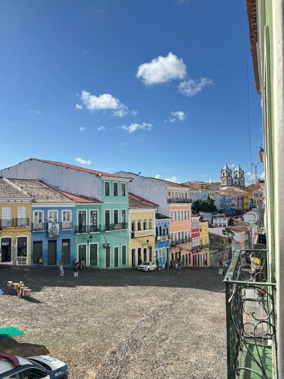 a view of a street in a town with buildings at Pousada Cores do Pelô in Salvador