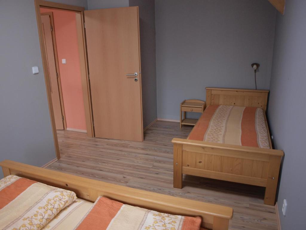 Postel nebo postele na pokoji v ubytování Apartments Viktoria Klinovec