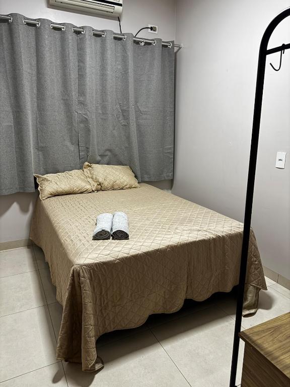 Postel nebo postele na pokoji v ubytování Casa elegante, próximo às cataratas