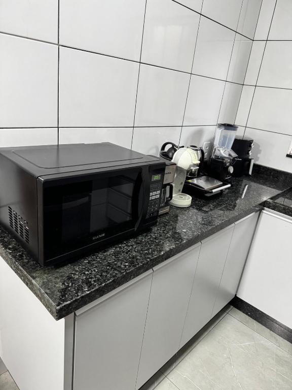 Kuchyň nebo kuchyňský kout v ubytování Casa elegante, próximo às cataratas