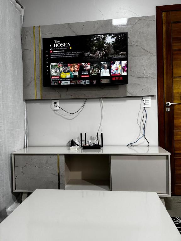 TV a/nebo společenská místnost v ubytování Casa elegante, próximo às cataratas