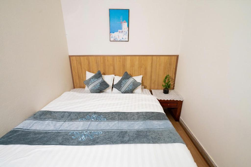 Postel nebo postele na pokoji v ubytování Airy Nest Hotel