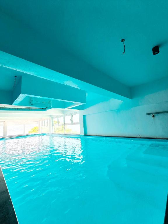 Bazén v ubytování Pangkor Pop Ash Hotel nebo v jeho okolí