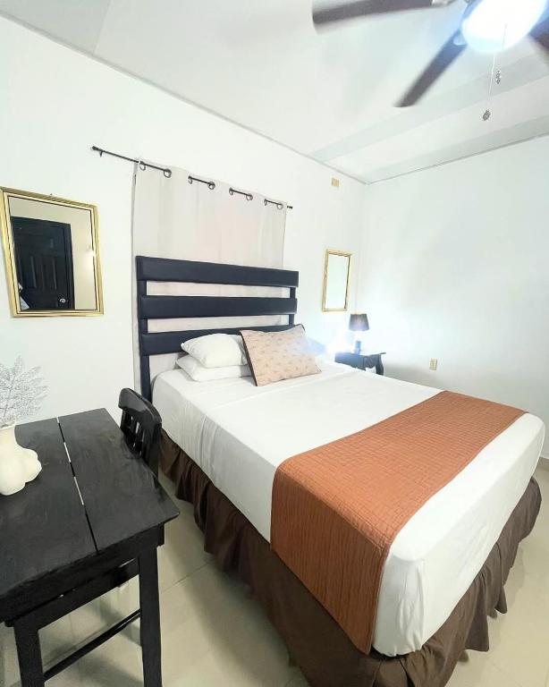 Ліжко або ліжка в номері Hotel Reynieri