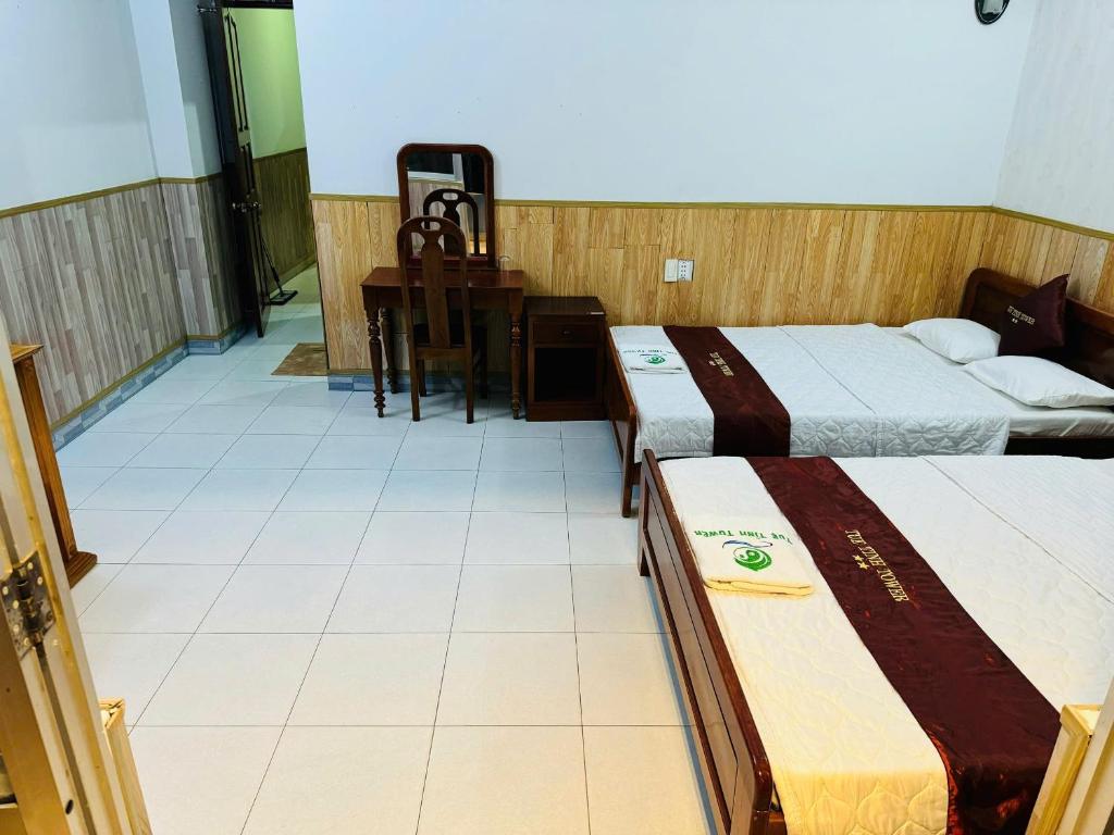 Postel nebo postele na pokoji v ubytování Tuệ Tĩnh