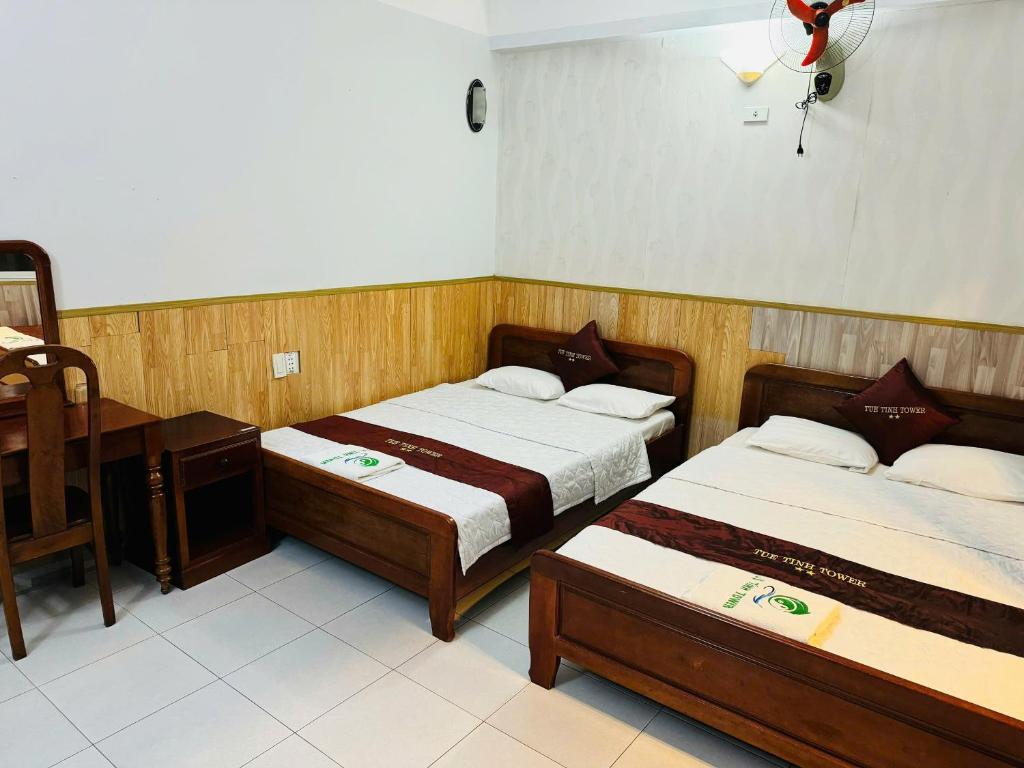 Postel nebo postele na pokoji v ubytování Tuệ Tĩnh