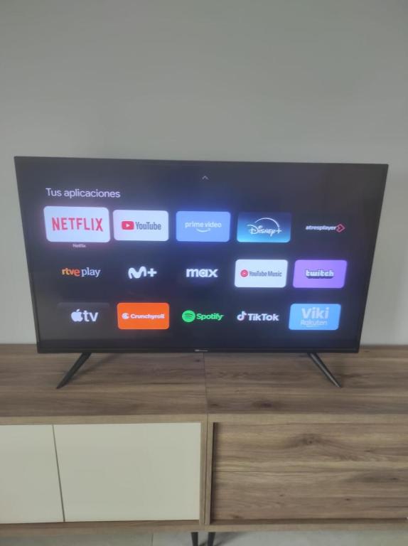 TV a/nebo společenská místnost v ubytování RoofTop Pool best view Narejos