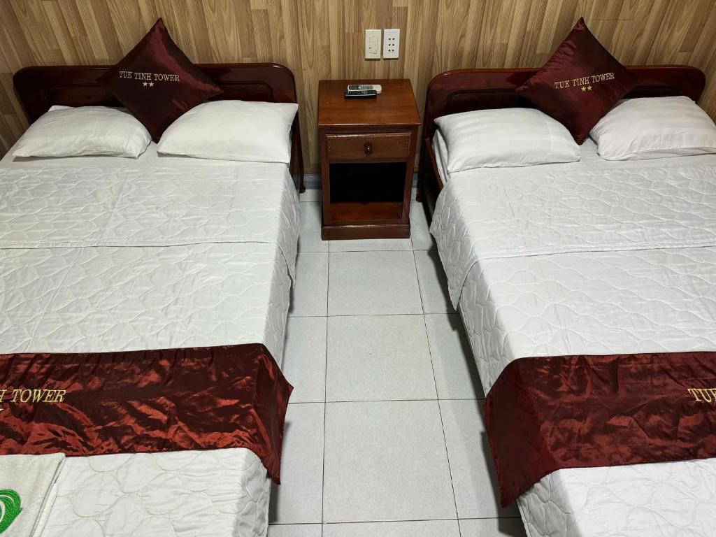 Postel nebo postele na pokoji v ubytování Tuệ Tĩnh