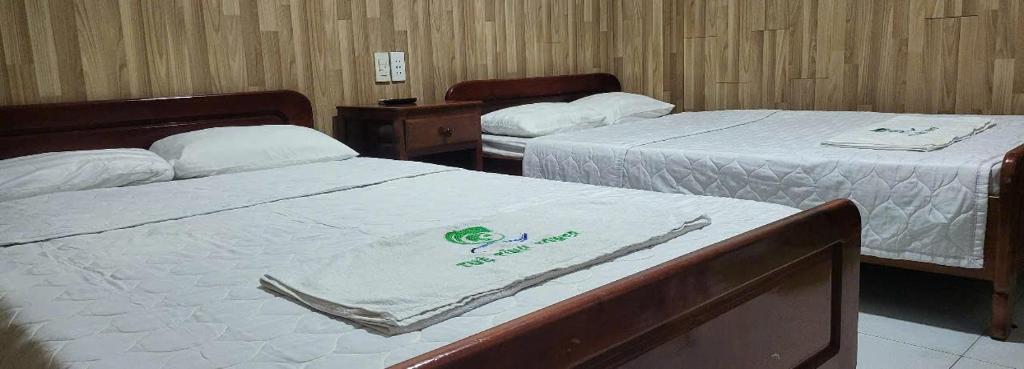 Postel nebo postele na pokoji v ubytování Tuệ Tĩnh