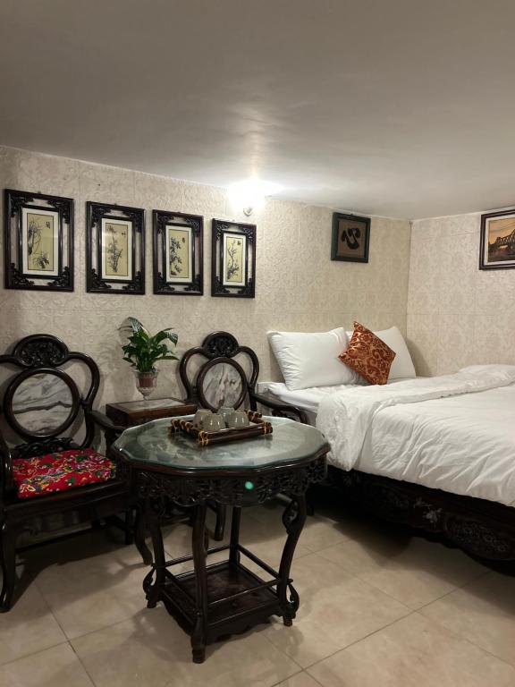 Postel nebo postele na pokoji v ubytování Charm Home 3