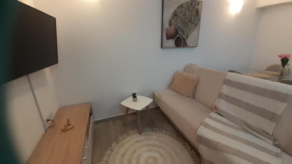 Televízia a/alebo spoločenská miestnosť v ubytovaní apartmani G&M