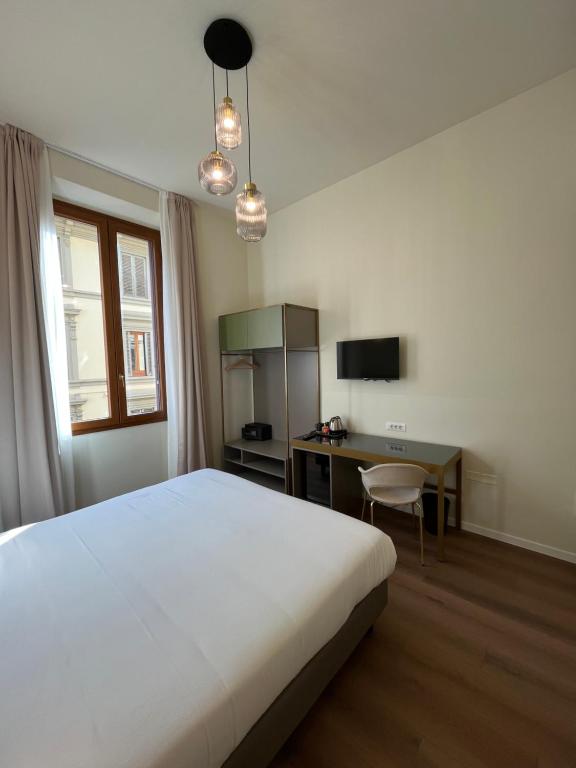 TV a/nebo společenská místnost v ubytování Hotel Duca D'Aosta