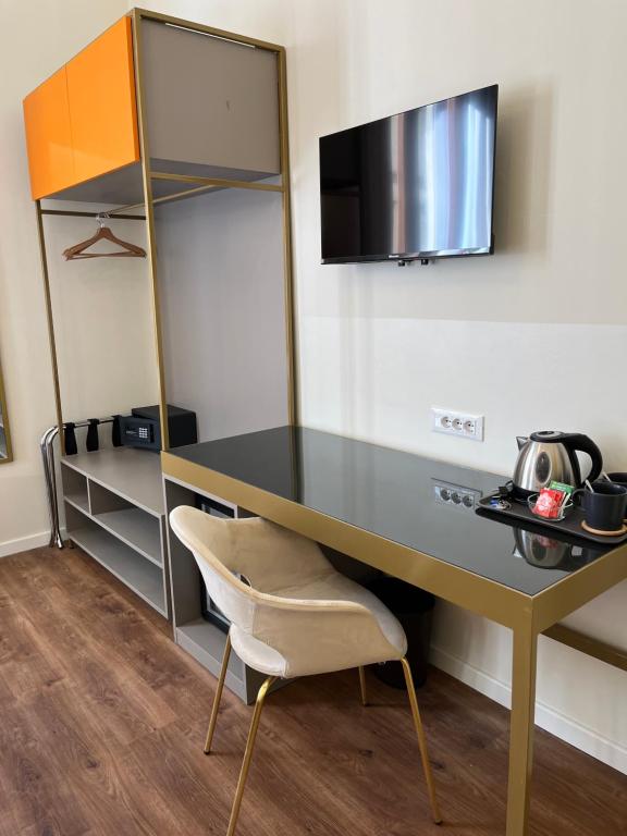 Kuchyň nebo kuchyňský kout v ubytování Hotel Duca D'Aosta