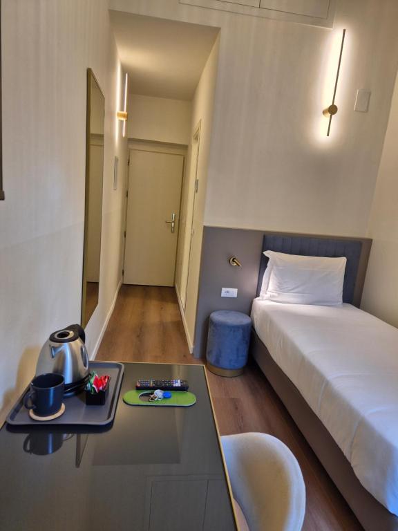 Postel nebo postele na pokoji v ubytování Hotel Duca D'Aosta