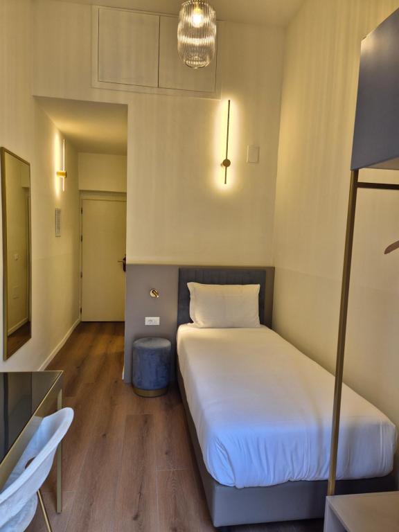 Postel nebo postele na pokoji v ubytování Hotel Duca D'Aosta